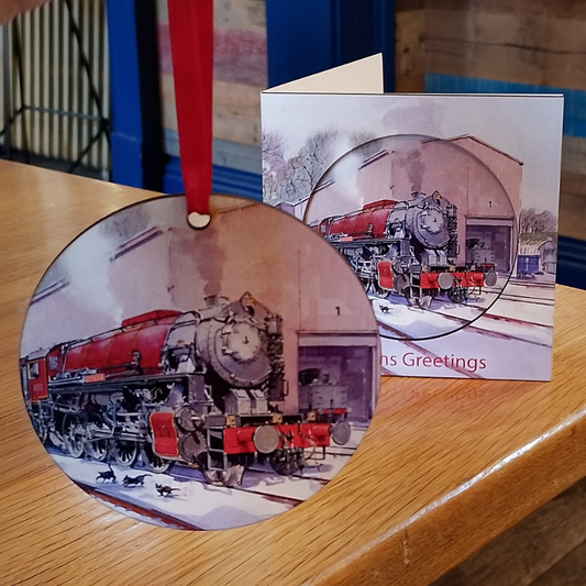 Photo showing the tree decoration that pops out of the card and reveals the same designs behind
