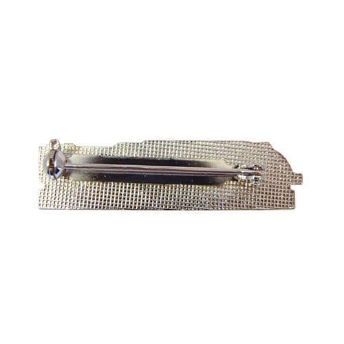 Silver coloured metal back of badge showing brooch style bar fastening.