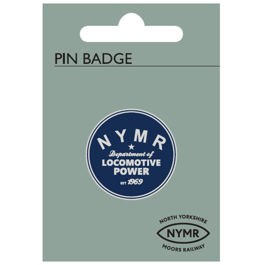round enamel pin badge in navy blue, shown her eon the backing card with the NYMR logo.