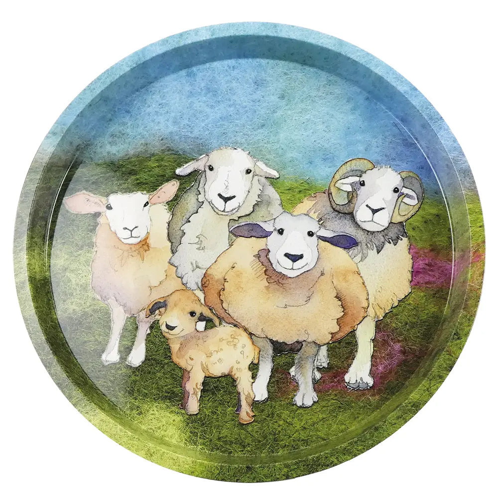 A gorgeous round tray with 5 cheery sheep all huddled together on a felted moorland scene.
