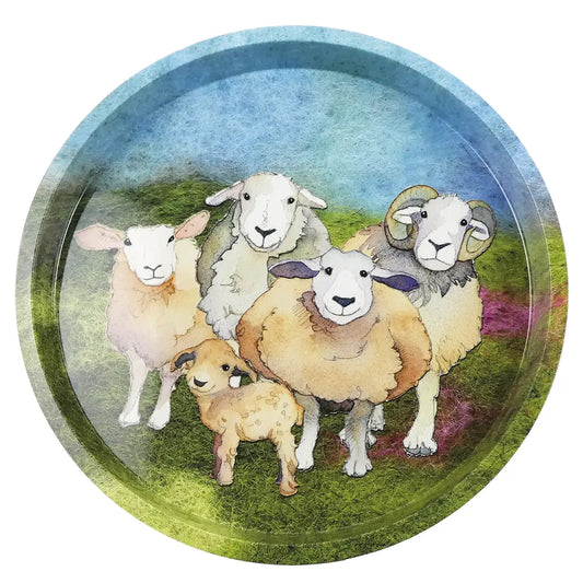 A gorgeous round tray with 5 cheery sheep all huddled together on a felted moorland scene.