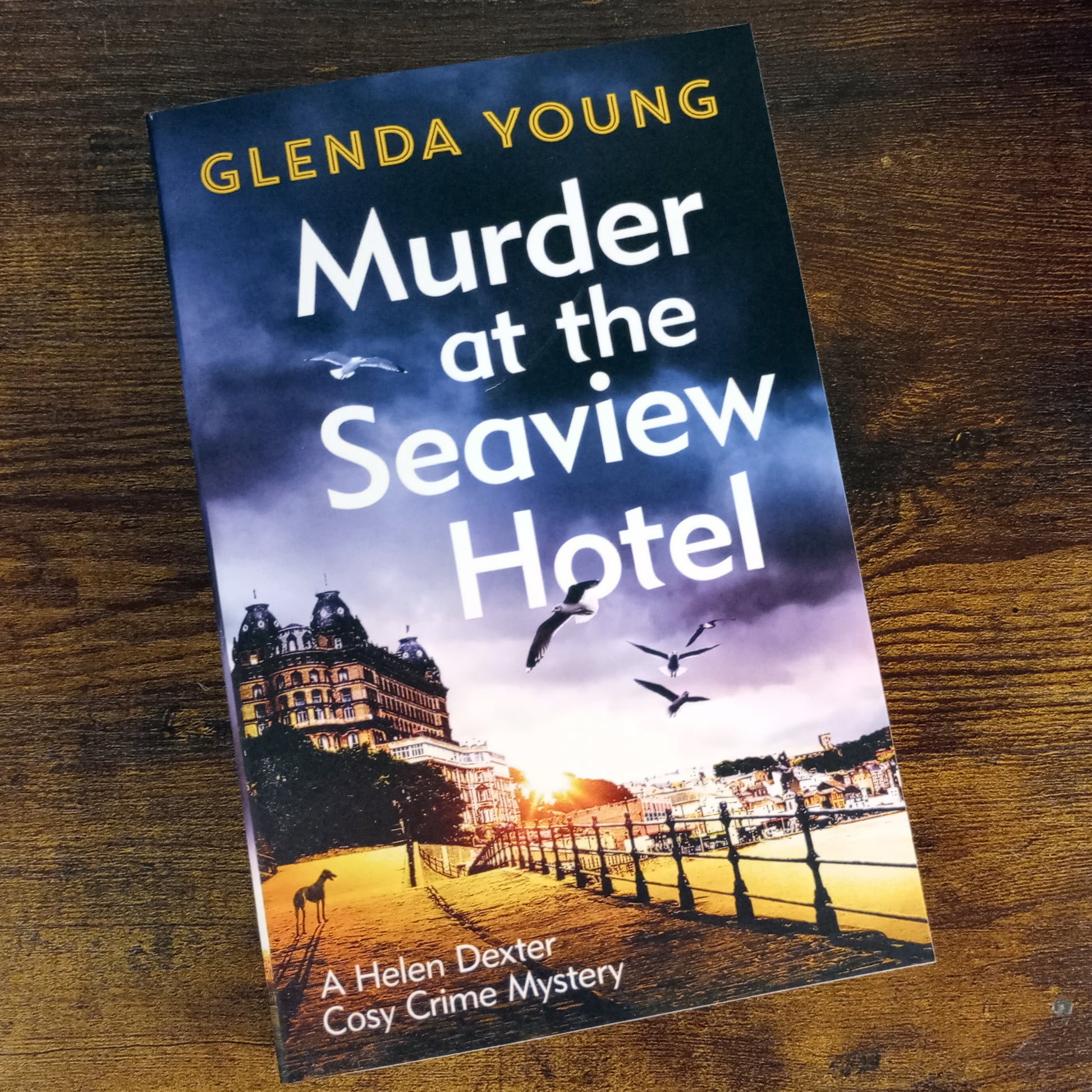 The book covers showing a view of the Grand Hotel Scarborough, with the seafront in the background and seagulls circling overhead.