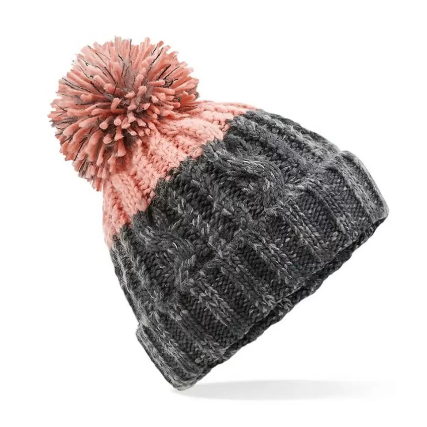Gray knit beanie with a pink pom-pom on a white background