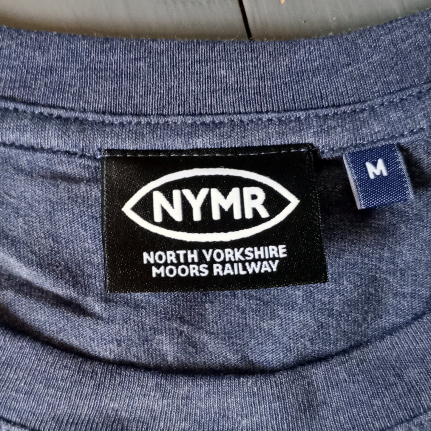 Close up of the NYMR neck label