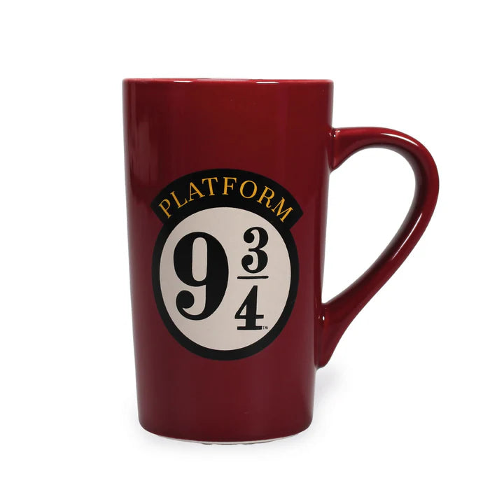 A tall latte mug in maroon with the Platfomr 9 3/4 logo on the front (handle to right) and the words Hogwarts Express on the back in yellow.