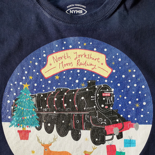 Close up of front of t-shirt showing print quality and image of train on navy t-shirt