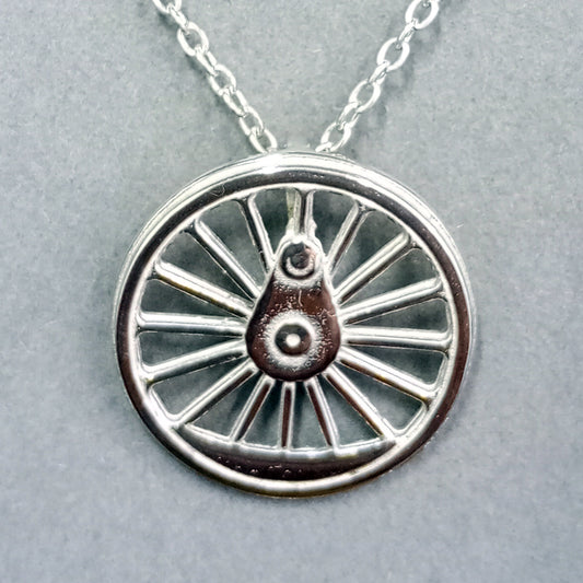 A pewter wheel in close up showing detail and finish.