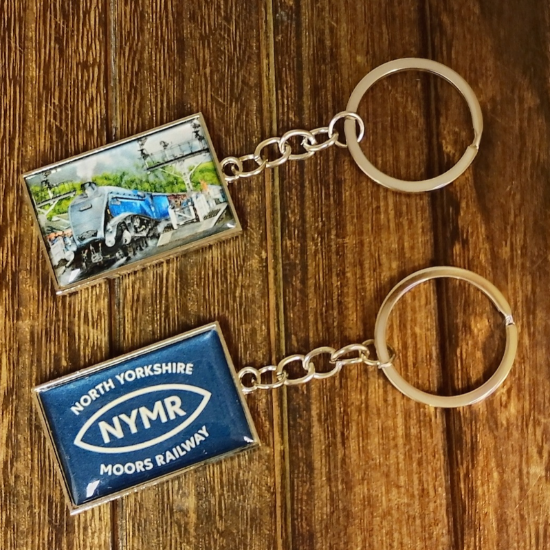 Image shows two keyrings placed so that you can see front and back designs.