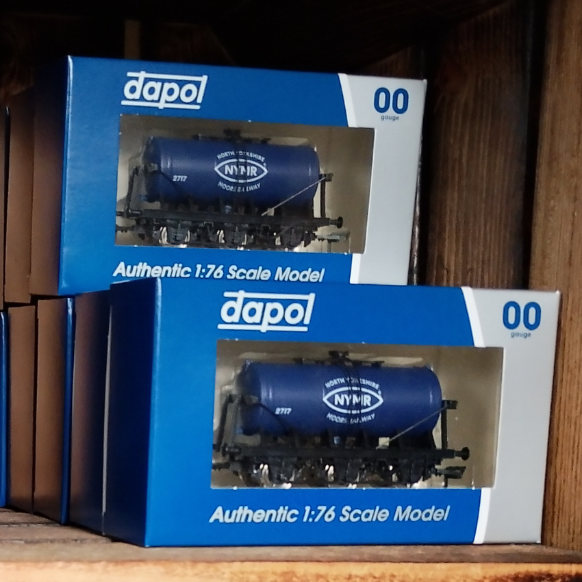 Boxes model milk tanker in blue with white NYMR logo. Packaging by Dapol 00 Gauge