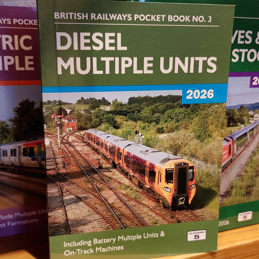 Book titled 'British Railways Pocket Book No. 3 Diesel Multiple Units' on a wooden surface.