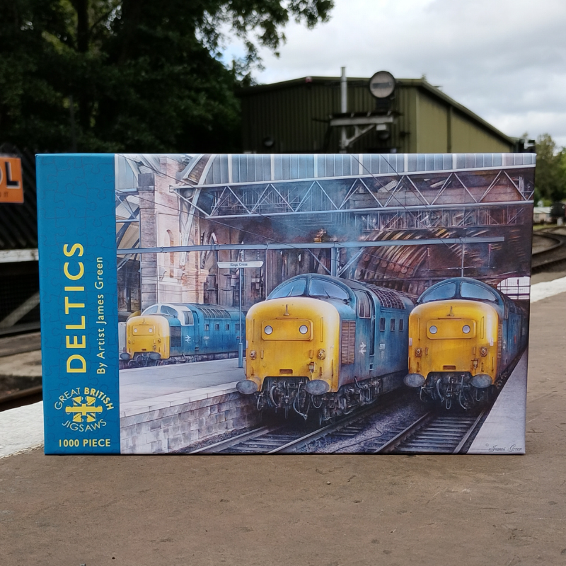 Jigsaw box with a painting of three deltics lined up at Kings Cross Station.