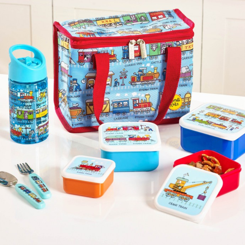 Selection of kids lunchware including tote lunch bag, bottle, snack boxes and cutlery all with matching funky trains design