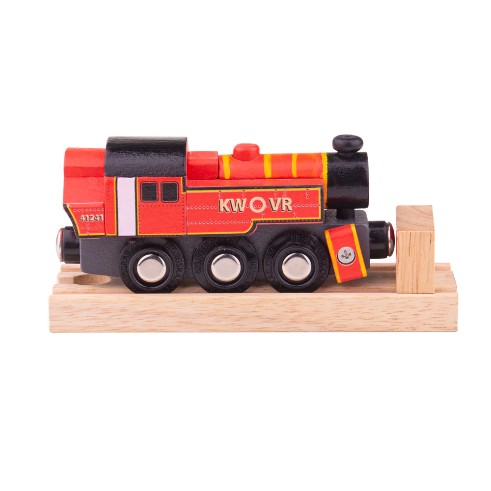 A red painted wooden locomotive on a piece of wooden track with a buffer stop.