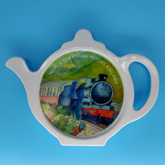 White tea bag tidy in shape of teapot with painting of steam train and North Yorkshire Moors Railway in white