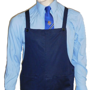 Dark blue bib and brace dungarees worn over pale blue shirt and railway tie