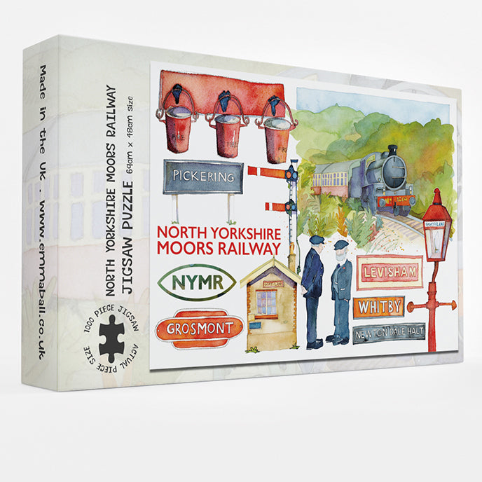 Jigsaw box with image on front featuring water colour painting of steam train and various paintings of signs, signal box, platform staff, etc.