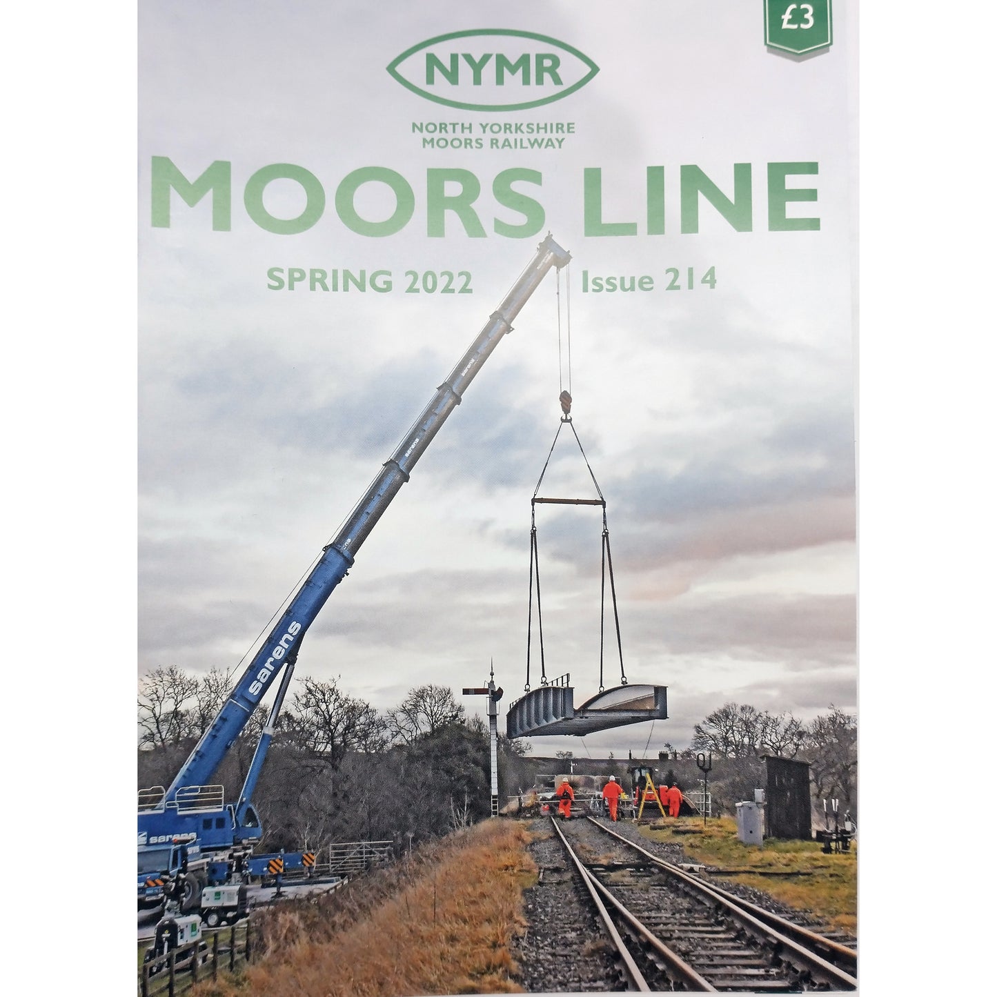 Front cover of N Y M R Moors Line Spring 2022 Issue 214 showing photo of  bridge being lowered into place by crane.