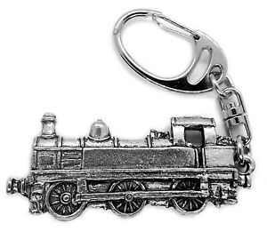Pewter key ring the shape of a steam engine.
